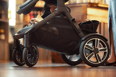 Nuna DEMI Next + Rider Board and PIPA urbn Travel System in Caviar